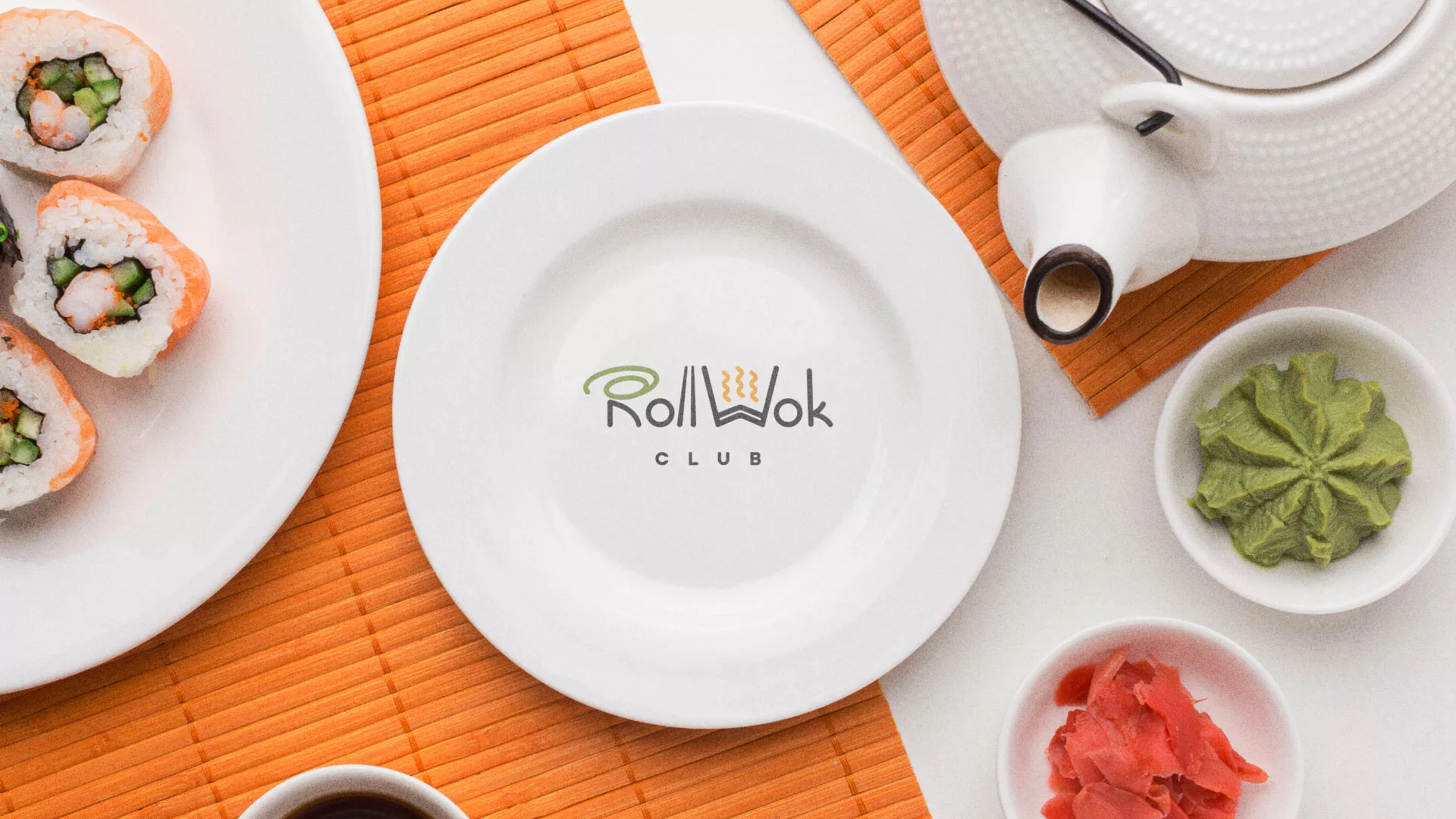 Разработка логотипа и фирменного стиля в Кизилюрте для суши-бара «Roll Wok Club» Разработка логотипа и фирменного стиля в Кизилюрте для суши-бара «Roll Wok Club»